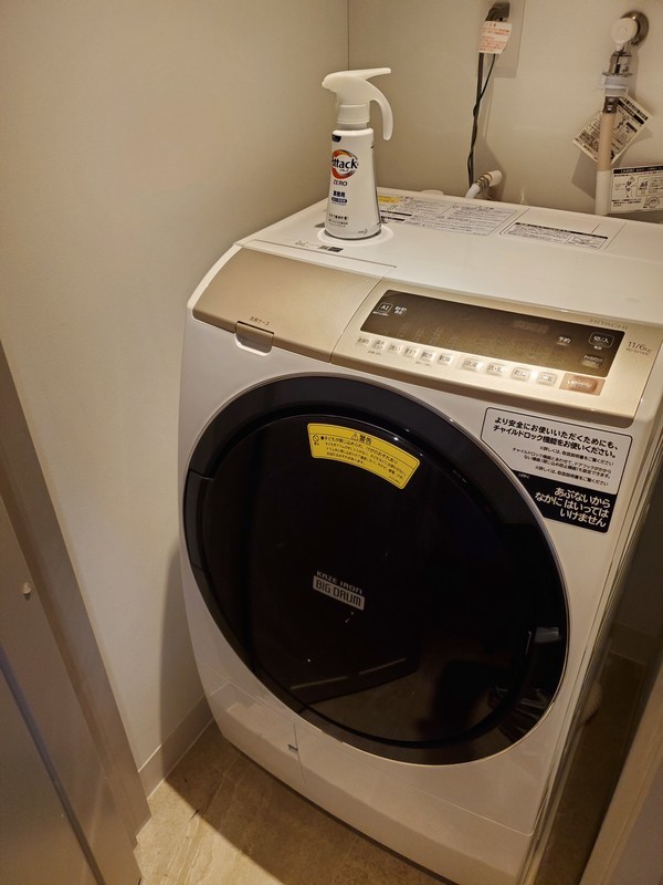 レクー沖縄北谷スパ&リゾート プレミア棟のデラックスプレミアムルームの洗濯機